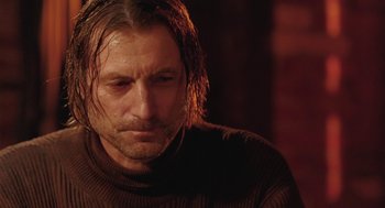 Movie still from “The Ugly Swans” (2006), directed by Konstantin Lopushanskiy – A person with long hair; Close Up shot, Over the shoulder angle