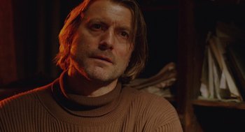 Movie still from “The Ugly Swans” (2006), directed by Konstantin Lopushanskiy – A person with long hair; Close Up shot, Low angle