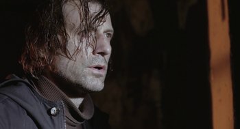 Movie still from “The Ugly Swans” (2006), directed by Konstantin Lopushanskiy – A person with long hair; Close Up shot, Low angle