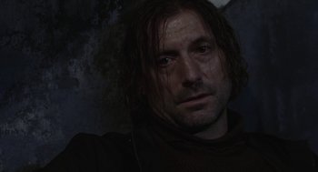 Movie still from “The Ugly Swans” (2006), directed by Konstantin Lopushanskiy – A person with wet hair; Close Up shot, Low angle