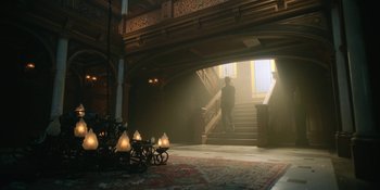Movie still from “The Umbrella Academy” (2019), created by Steve Blackman – A man walking down a staircase in a building; Extreme Wide shot, Low angle