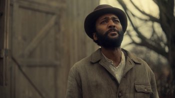 Movie still from “Anne with an E” (2017), created by Moira Walley-Beckett – A man with a beard wearing a brown hat; Close Up shot, Low angle