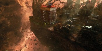 Movie still from “The Umbrella Academy” (2019), created by Steve Blackman – An image of a building on the edge of a cliff; Extreme Wide shot, Overhead angle