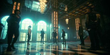 Movie still from “The Umbrella Academy” (2019), created by Steve Blackman – A group of people standing in a room with lights; Extreme Wide shot, Low angle
