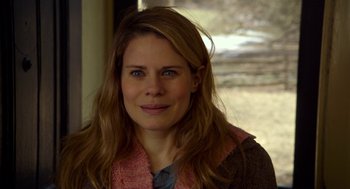 Movie still from “The Visit” (2015), directed by M. Night Shyamalan – A person with long brown hair; Close Up shot, Over the shoulder angle