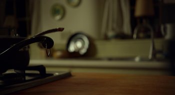 Movie still from “The Visit” (2015), directed by M. Night Shyamalan – A faucet and a sink in a bathroom; Extreme Close Up shot, High angle