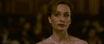 Movie still from “The Walker” (2007), directed by Paul Schrader – A person wearing a necklace; Close Up shot, Low angle