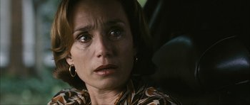 Movie still from “The Walker” (2007), directed by Paul Schrader – A person crying in a car; Close Up shot, Over the shoulder angle