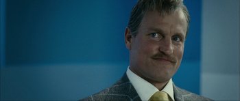 Movie still from “The Walker” (2007), directed by Paul Schrader – A person wearing a suit and tie; Close Up shot, Low angle