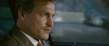 Movie still from “The Walker” (2007), directed by Paul Schrader – A person wearing a suit and tie; Close Up shot, Low angle