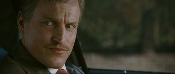 Movie still from “The Walker” (2007), directed by Paul Schrader – A person wearing a suit and tie; Close Up shot, Low angle