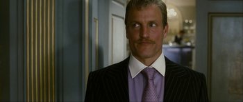 Movie still from “The Walker” (2007), directed by Paul Schrader – A person wearing a suit and tie; Close Up shot, Low angle