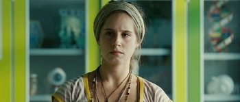 Movie still from “The Wave” (2008), directed by Dennis Gansel – A young woman with a head scarf on; Close Up shot, Low angle