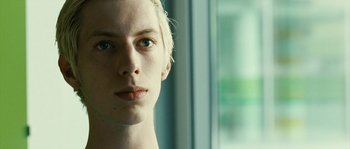 Movie still from “The Wave” (2008), directed by Dennis Gansel – A person's face in front of a window; Close Up shot, Over the shoulder angle