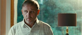 Movie still from “The Wave” (2008), directed by Dennis Gansel – A person wearing a white shirt; Close Up shot, Over the shoulder angle