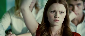 Movie still from “The Wave” (2008), directed by Dennis Gansel – A person with long brown hair; Close Up shot, Low angle