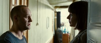 Movie still from “The Wave” (2008), directed by Dennis Gansel – A man and a woman face to face in a room; Close Up shot, Over the shoulder angle