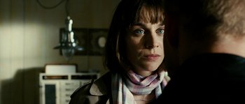 Movie still from “The Wave” (2008), directed by Dennis Gansel – A person wearing a scarf; Close Up shot, Over the shoulder angle