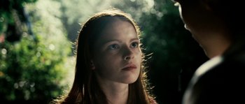 Movie still from “The Wave” (2008), directed by Dennis Gansel – A young girl is looking into the distance; Close Up shot, Low angle