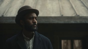 Movie still from “Anne with an E” (2017), created by Moira Walley-Beckett – A man wearing a hat and a jacket; Close Up shot, Low angle