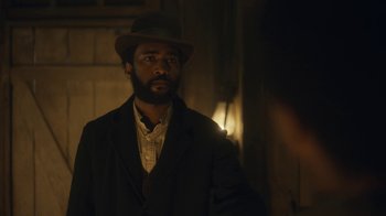 Movie still from “Anne with an E” (2017), created by Moira Walley-Beckett – A man wearing a hat standing in front of a mirror; Close Up shot, Over the shoulder angle