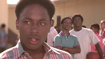 Movie still from “The Wood” (1999), directed by Rick Famuyiwa – A group of young men standing next to each other; Close Up shot, Over the shoulder angle