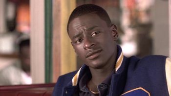 Movie still from “The Wood” (1999), directed by Rick Famuyiwa – A person wearing a jacket; Close Up shot, High angle