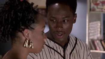 Movie still from “The Wood” (1999), directed by Rick Famuyiwa – A man and a woman are talking to each other; Close Up shot, Over the shoulder angle