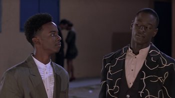 Movie still from “The Wood” (1999), directed by Rick Famuyiwa – Two young men standing next to each other; Close Up shot, Over the shoulder angle