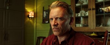 Movie still from “The Young and Prodigious T.S. Spivet” (2013), directed by Jean-Pierre Jeunet – A person wearing a red shirt; Close Up shot, Low angle