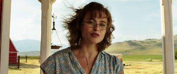 Movie still from “The Young and Prodigious T.S. Spivet” (2013), directed by Jean-Pierre Jeunet – A person wearing glasses; Close Up shot, Low angle
