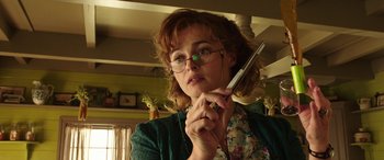 Movie still from “The Young and Prodigious T.S. Spivet” (2013), directed by Jean-Pierre Jeunet – A woman holding a cell phone up to her ear; Close Up shot, Low angle