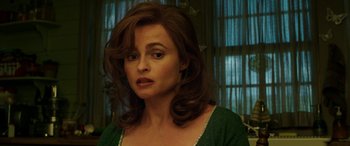 Movie still from “The Young and Prodigious T.S. Spivet” (2013), directed by Jean-Pierre Jeunet – A person with long hair; Close Up shot, High angle