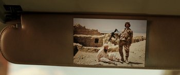 Movie still from “The Young and Prodigious T.S. Spivet” (2013), directed by Jean-Pierre Jeunet – A picture of a soldier with a gun in his hand and another soldier with a gun in his hand; Extreme Close Up shot, High angle