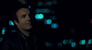 Movie still from “Thief” (1981), directed by Michael Mann – A person in the dark; Close Up shot, Low angle