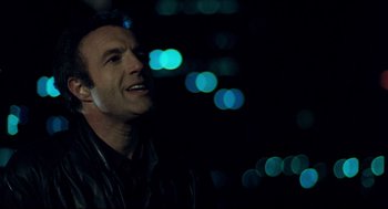 Movie still from “Thief” (1981), directed by Michael Mann – A person wearing a jacket; Close Up shot, Low angle