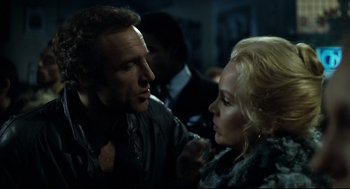 Movie still from “Thief” (1981), directed by Michael Mann – A man and a woman looking at one another; Close Up shot, Over the shoulder angle