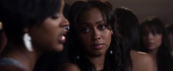 Movie still from “Think Like a Man” (2012), directed by Tim Story – Two women are talking to each other in a room; Close Up shot, Over the shoulder angle