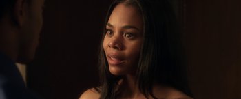 Movie still from “Think Like a Man” (2012), directed by Tim Story – A person with long black hair; Close Up shot, Over the shoulder angle
