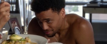 Movie still from “Think Like a Man” (2012), directed by Tim Story – A person with a plate of food; Close Up shot, Overhead angle