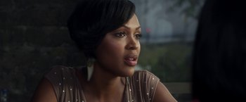 Movie still from “Think Like a Man” (2012), directed by Tim Story – A person wearing a dress; Close Up shot, Over the shoulder angle