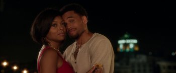 Movie still from “Think Like a Man” (2012), directed by Tim Story – A man and a woman posing for a picture; Close Up shot, Over the shoulder angle