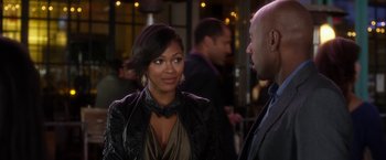 Movie still from “Think Like a Man” (2012), directed by Tim Story – A woman in a leather jacket talking to a man in a suit; Close Up shot, Over the shoulder angle