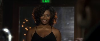Movie still from “Think Like a Man” (2012), directed by Tim Story – A beautiful young woman with a smile on her face; Close Up shot, Over the shoulder angle