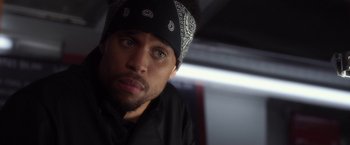 Movie still from “Think Like a Man” (2012), directed by Tim Story – A person wearing a hat; Close Up shot, Over the shoulder angle