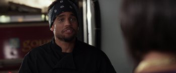 Movie still from “Think Like a Man” (2012), directed by Tim Story – A person with a bandanna on; Close Up shot, Over the shoulder angle