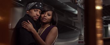 Movie still from “Think Like a Man” (2012), directed by Tim Story – A man and a woman posing for a picture; Close Up shot, Low angle