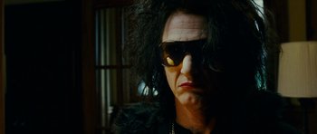 Movie still from “This Must Be the Place” (2011), directed by Paolo Sorrentino – A person wearing sunglasses; Close Up shot, Low angle