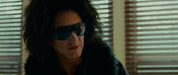 Movie still from “This Must Be the Place” (2011), directed by Paolo Sorrentino – A person wearing sunglasses and a jacket; Close Up shot, Low angle