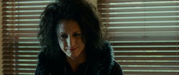 Movie still from “This Must Be the Place” (2011), directed by Paolo Sorrentino – A person wearing a black jacket; Close Up shot, Low angle